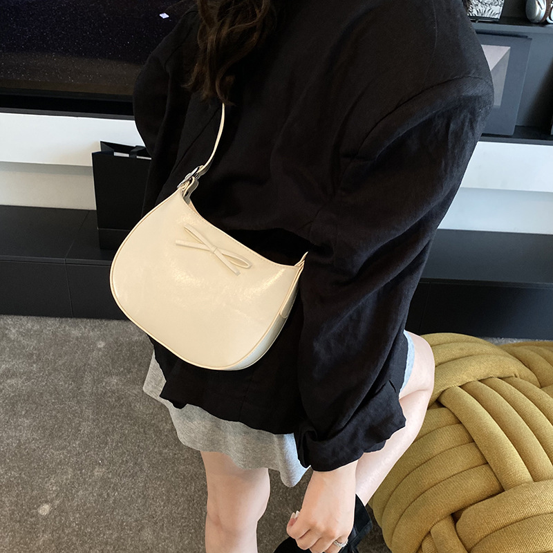 Nicho coreano de lujo ligero arco brazo bolso para mujeres 2025 nuevo estilo versátil bolso de hombro de estilo extranjero bolso de moda