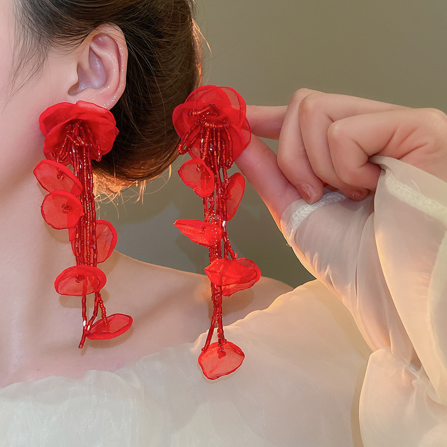 Pendientes de malla de pétalo de dopamina Pendientes de estilo de vacaciones junto al mar de estilo nuevo estilo caliente Pendientes de temperamento exagerado de todo fósforo al por mayor