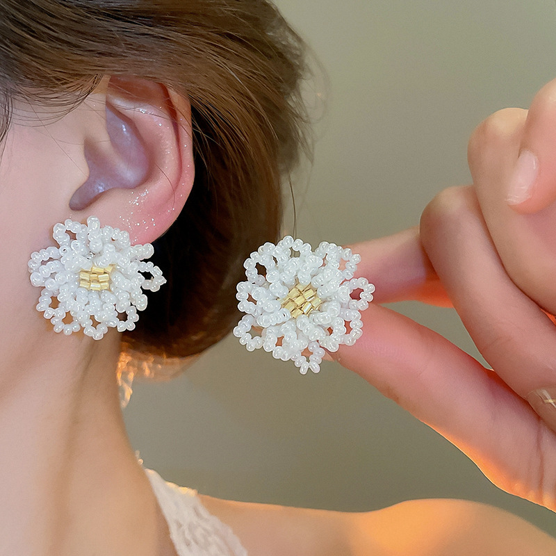 Pendientes de flor de lazo elegante de súper hada de plata Pendientes de moda de lujo ligero francés Pendientes de todo fósforo dulce de estilo literario