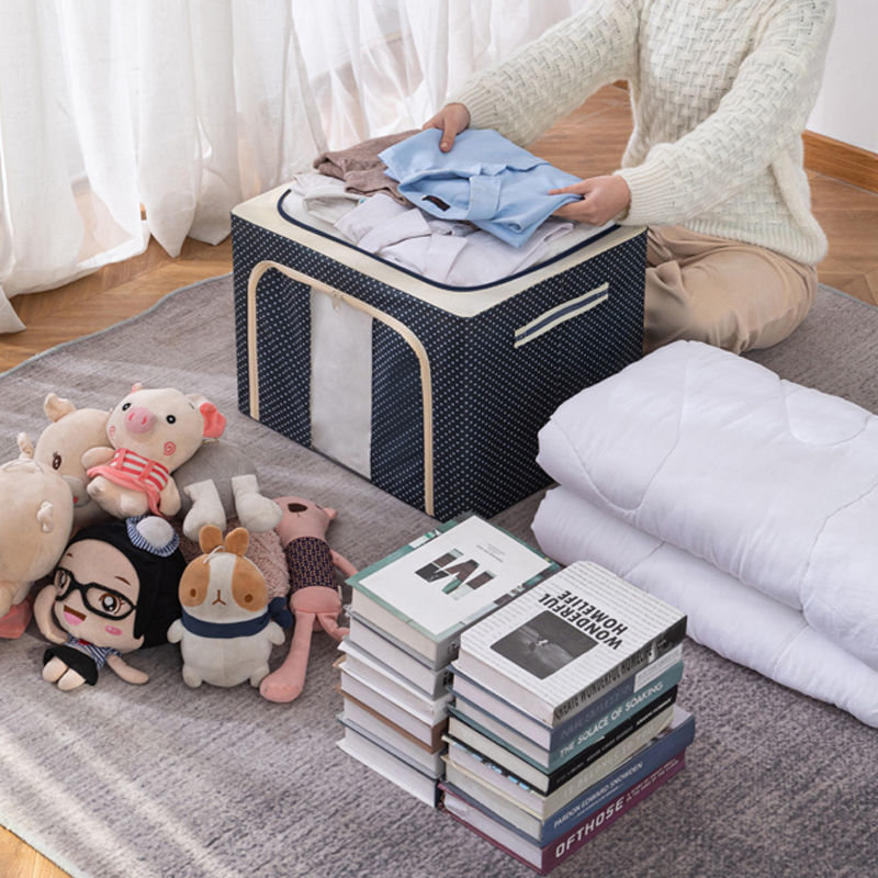 La nueva caja de almacenamiento para el hogar con ventana transparente plegable engrosada de gran capacidad abre el almacenamiento de equipaje antes de abrir la caja de almacenamiento de ropa