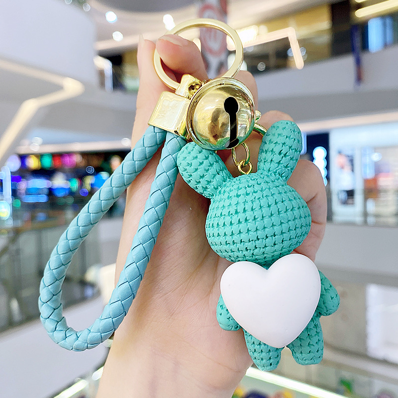 Resina creativa melocotón corazón tejido amor conejo llavero al por mayor ins pareja escuela coche llavero colgante