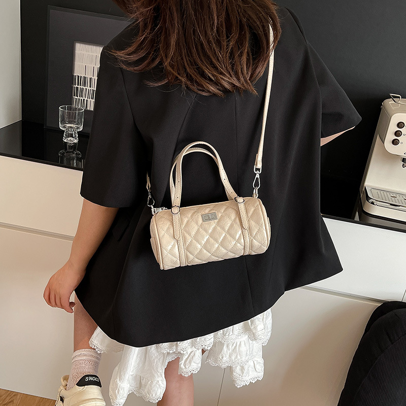 Bolsa de moda casual de grille cilíndrica para mujeres 2026 verano pequeña fragancia simple bolso de hombro diario image 3