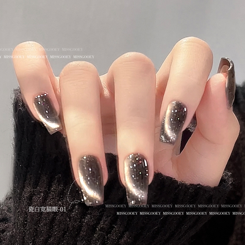 Porcelana retro blanco ancho ojo de gato 2024 Otoño e Invierno Nueva Caja Mágica Super brillante pegamento ojo de gato esmalte de uñas belleza tienda especial