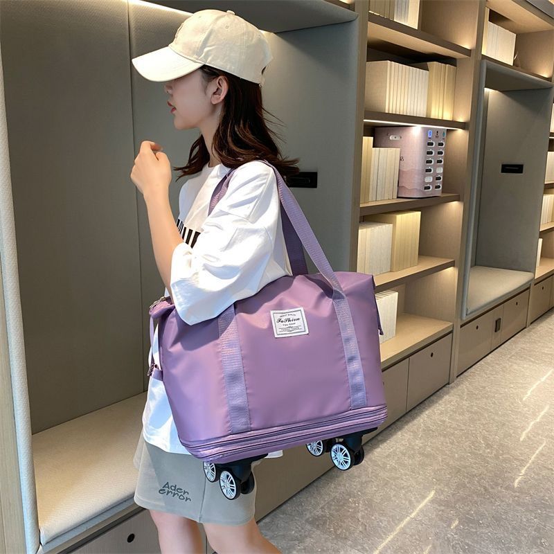 Bolsa de viaje de gran capacidad portátil de gran capacidad polea bolsa de equipaje impermeable en espera de producción bolsa de viaje de negocios corta distancia