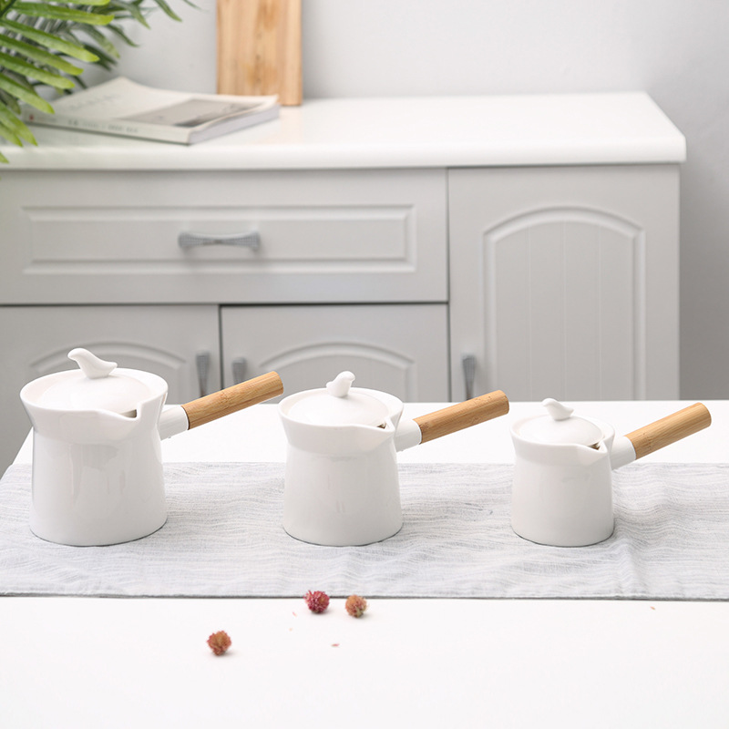 Fábrica directa cerámica flor tetera mango de madera olla eléctrica cerámica estufa especial gran capacidad tetera hogar hervidor frío leche olla