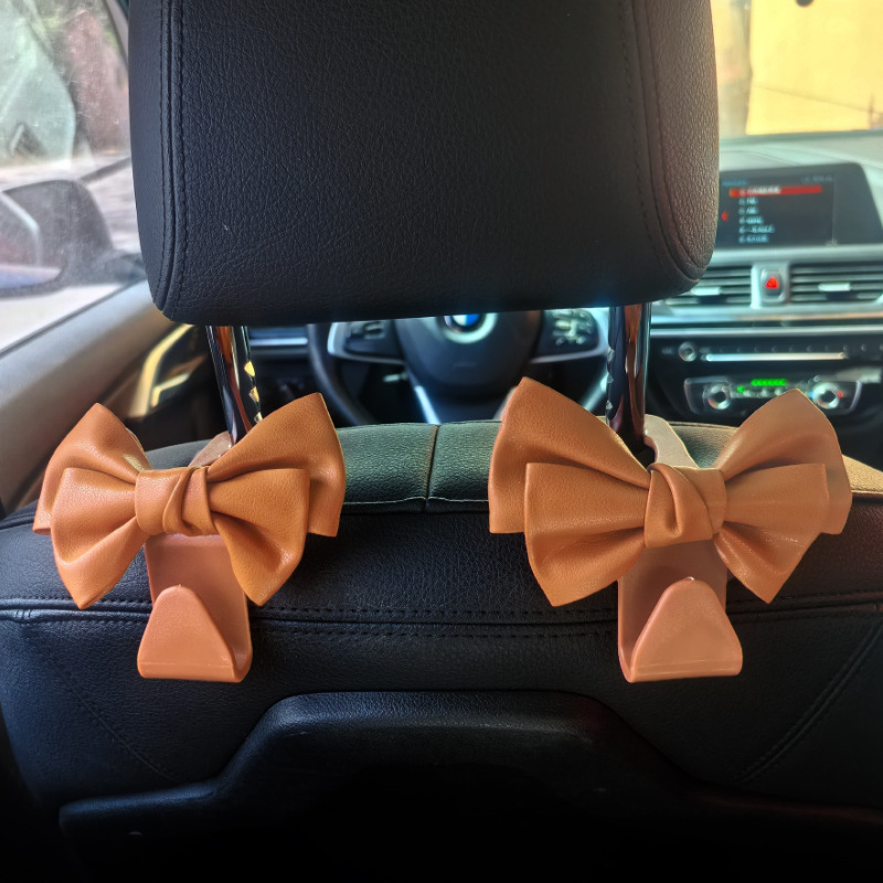 Gancho trasero multifuncional en el automóvil Gancho femenino interior creativo Gancho para automóvil asiento invisible para automóvil