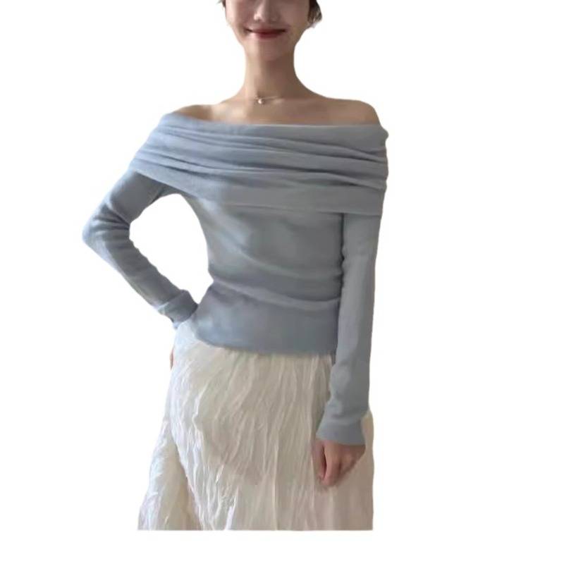 フランスの高級感のある肩の長袖のニットの女性の春の気質の優しさは肩の独特な絶美の上着のファッションを現します。|undefined