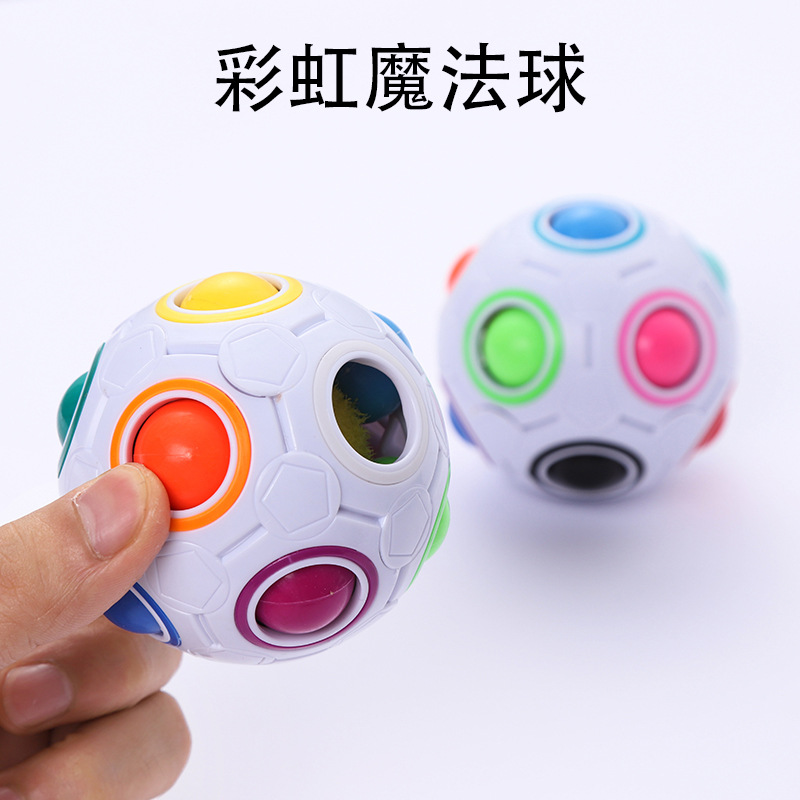En stock Bola de arco iris mágico Cubo de Rubik juguete de descompresión de inteligencia de 12 hoyos prensa diversión BOLA MÁGICA regalo de la actividad de los niños