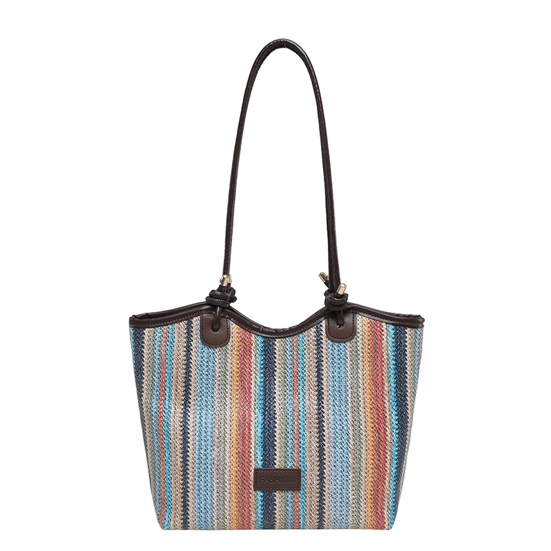 2026 nueva bolsa de tejido para mujeres de gran capacidad de viaje bolso de hombro portátil a rayas de moda bolso de mochila