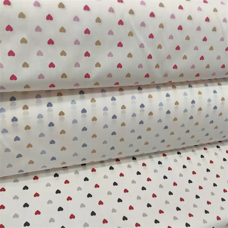 爱心印花布棉斜纹布料 全棉儿童床品家居服豆豆毯面料批发