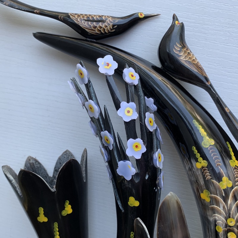 牛の角の工芸品は眉の先の牛の角の彫刻が好きです。|undefined