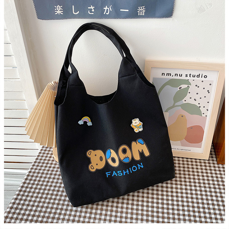 2021 Summer Japanese-style simple canvas bag, student backpack, single-shoulder handbag for going out, cartoon badge cotton bag undefined