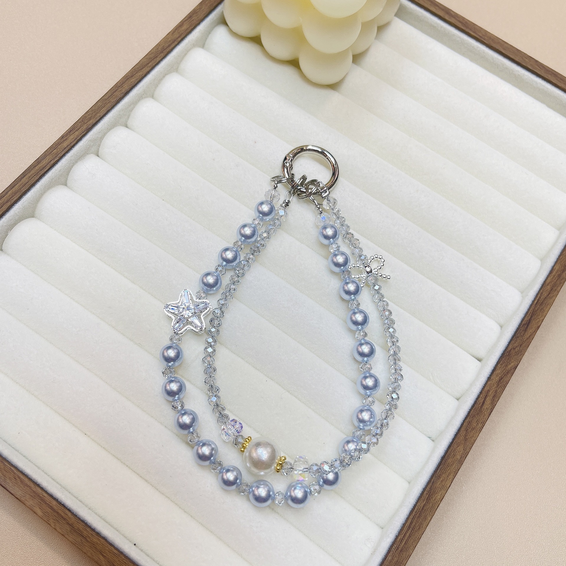 Cordón de teléfono móvil de doble cadena de cristal de moda cordón de muñeca con cuentas de alta gama colgante de estrella llavero de perlas cabello de una pieza