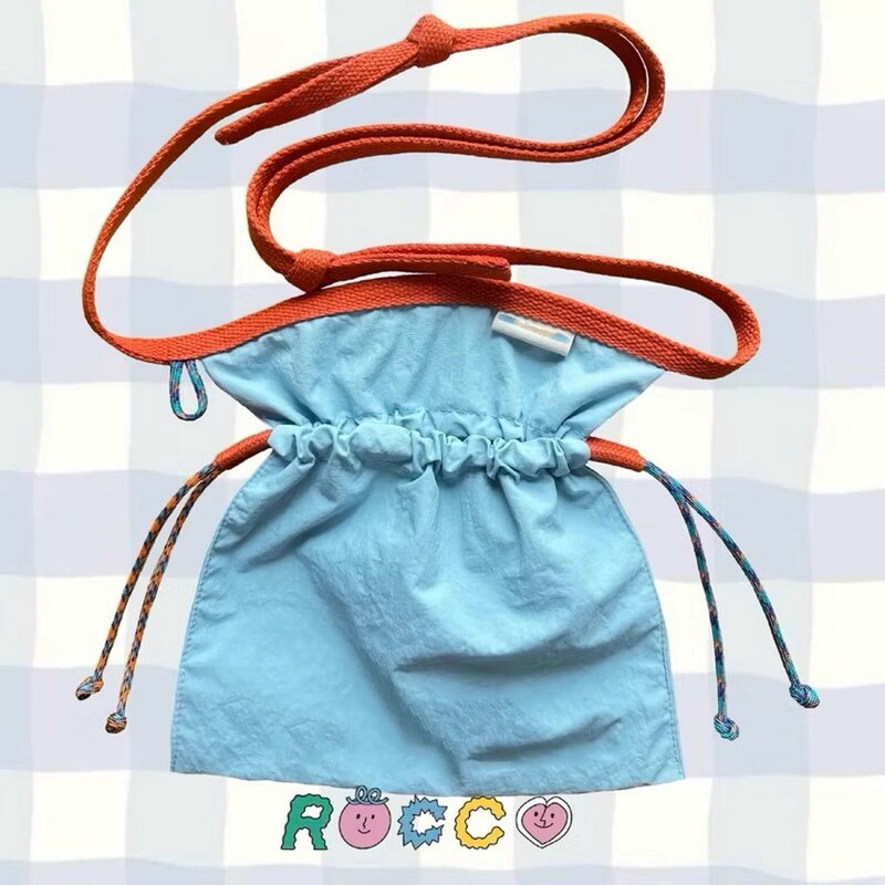 Thai niche designer brand drawstring crossbody nylon bag, lightweight, versatile, cute, and trendy phone bag Thai niche designer brand drawstring crossbody nylon bag, lightweight, versatile, cute, and trendy phone bag
