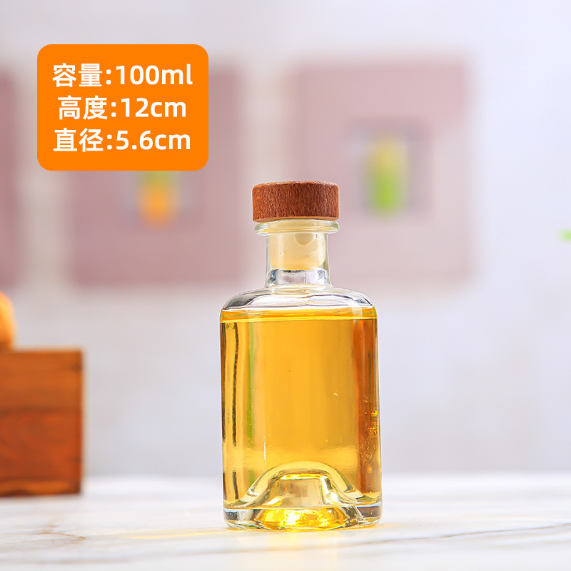 Botella de vodka al por mayor Botella de vino de fondo cóncavo Botella de vino extranjero Botella de vino amarillo de gran capacidad Botella de vino de ciruela transparente Botella de vino de frutas de vidrio