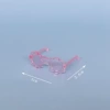 Plastic fuchsia glasses