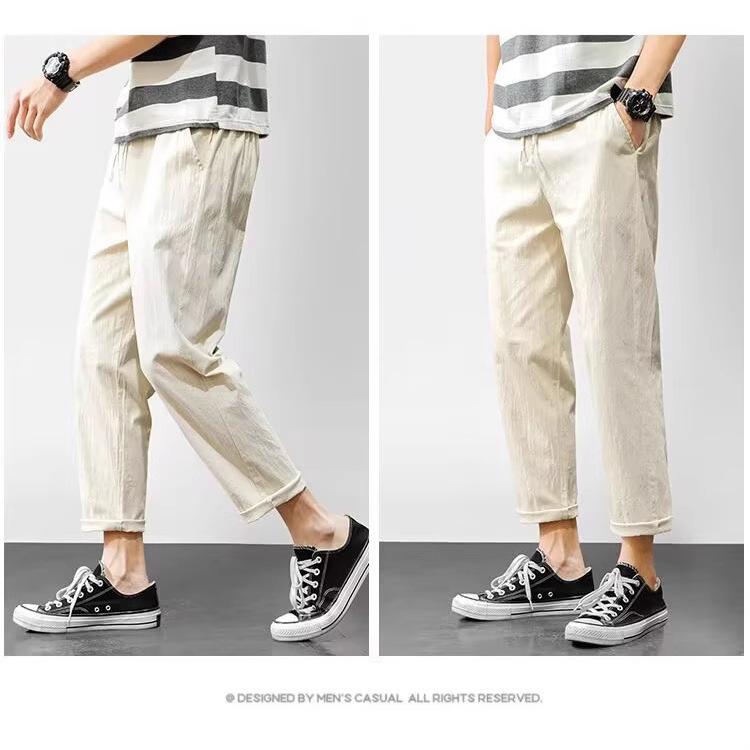 Pantalones casuales para niños otoño nueva marca de moda ropa de trabajo recta suelta nueve puntos pantalones largos deportivos 2025 primavera y otoño ropa de hombre
