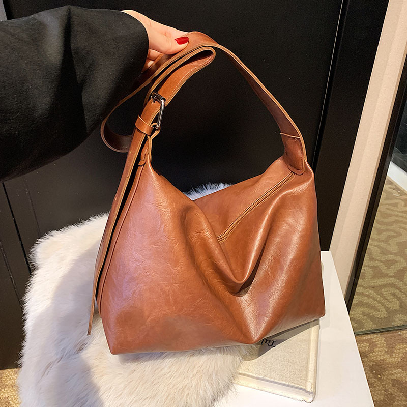 Bolso de gran capacidad relajado retro primavera 2025 nueva moda mochila de hombro textural bolso de dumpling damas