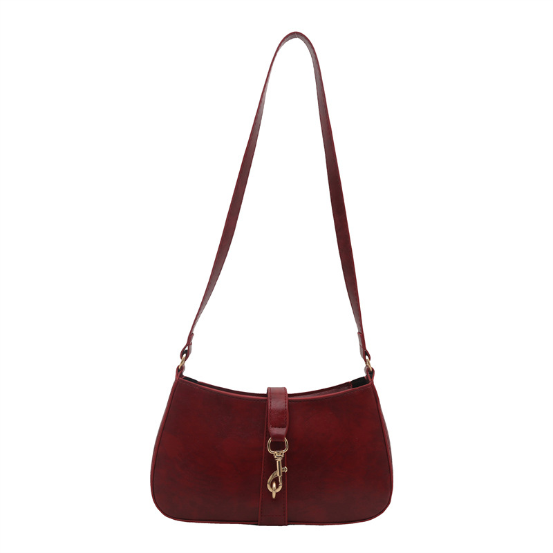 Bolsa de brazo francesa nicho para mujeres 2025 primavera y verano nueva moda moda personalidad bolso de palo estilo coreano bolso de hombro retro