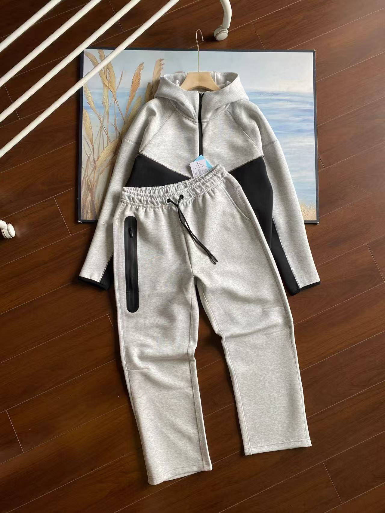 25 años primavera y otoño nuevo estilo casual deportes capa de aire chaqueta y traje de pantalón 54 y 61 traje suelto