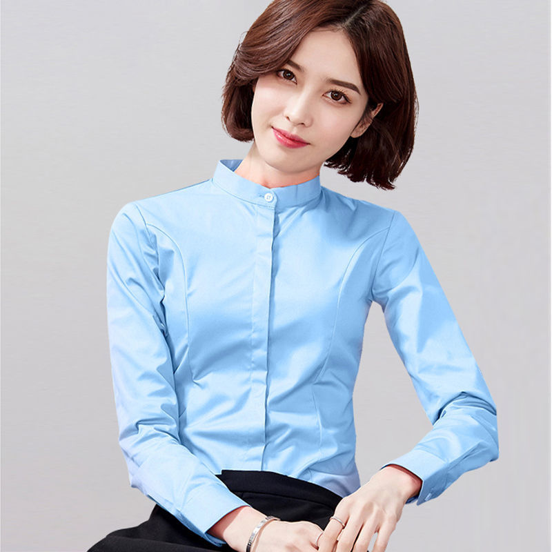 暗いボタンの立襟の韓国版の女性の職業のシャツのカジュアルな婦人服の上着の大きいサイズの長袖の防走光の白いシャツ