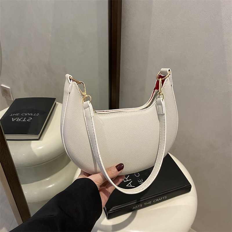 2025 primavera y verano nueva moda ocio media luna bolso bolso de nicho bolso de mujer minimalista bolso de hombro axilar