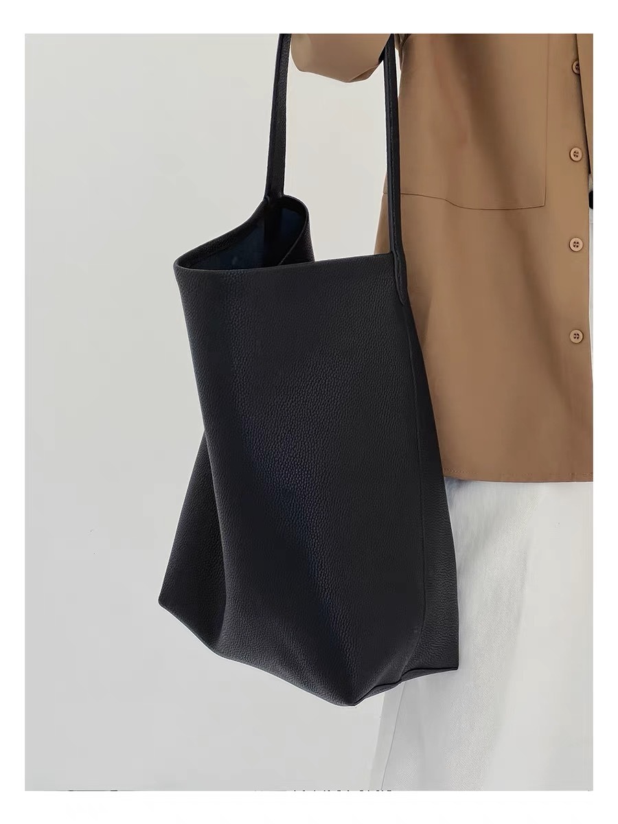 牛革トートバッグ女性のための 2025 新しいシングルショルダー大容量ショッピングバッグカジュアル怠惰なスタイル脇の下バッグ通勤バッグ