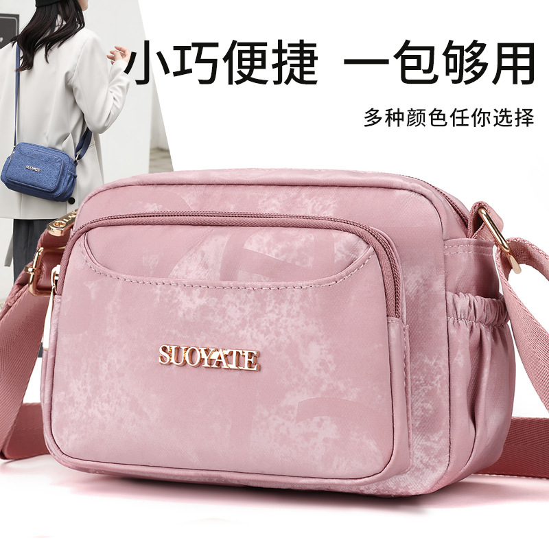 Nuevo tipo de mochila de mamá ligera impermeable tela de Oxford bolsas de mujer de mediana edad ocio deportivo mochila de nylon pequeña