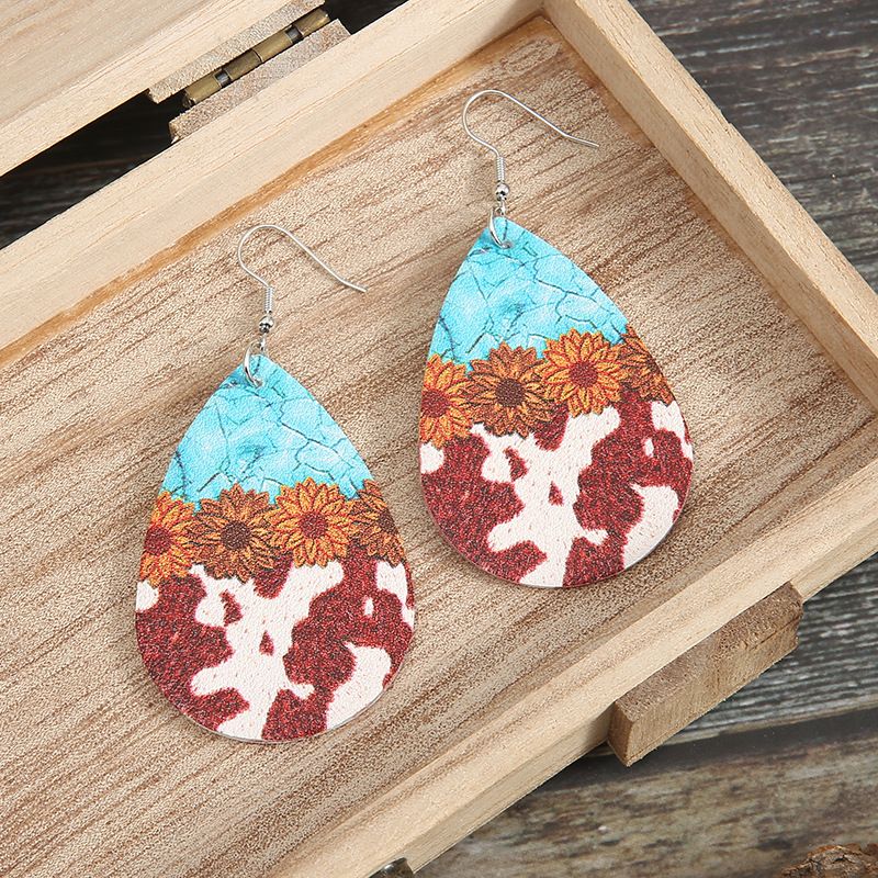 Fashion Turquoise Cow Grain Sunflower Pattern Leather Earrings display picture 4