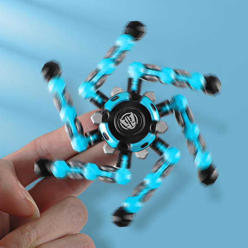 Fingertip Gyro deformable robot giratorio juguete mecánico de los niños tecnología negro espiral entre los dedos niño descompresión