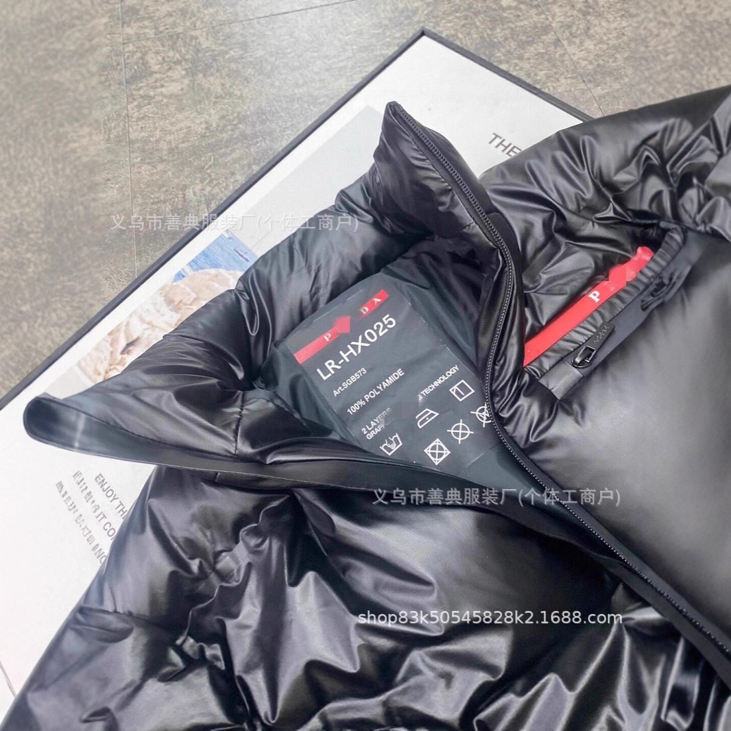 PD Pujia estación europea pareja de invierno con bolsillo de etiqueta roja chaqueta de plumón chaqueta de moda para hombres y mujeres