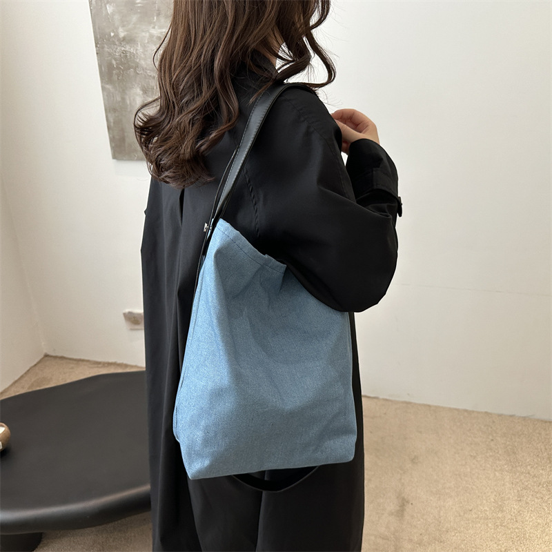 Bolso de denim de gran capacidad para mujeres verano 2024 nueva moda coreana nicho bolso de cubo bolso de hombro mochila