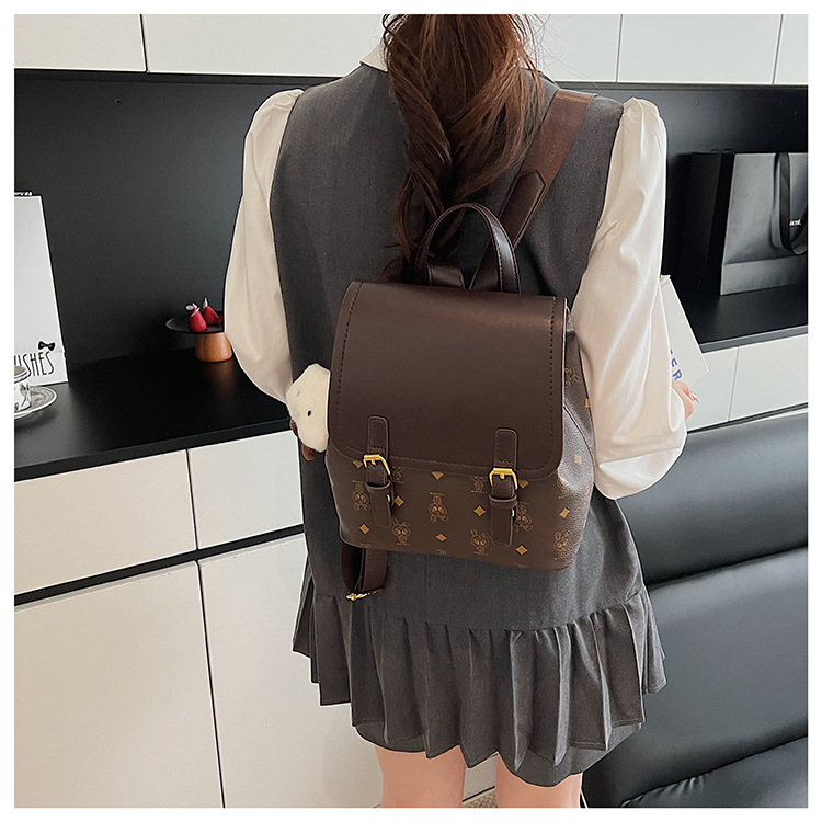 This is a niche design for women, featuring cartoon animal prints. It is a pink backpack with a high level of appearance and large capacity for travel undefined