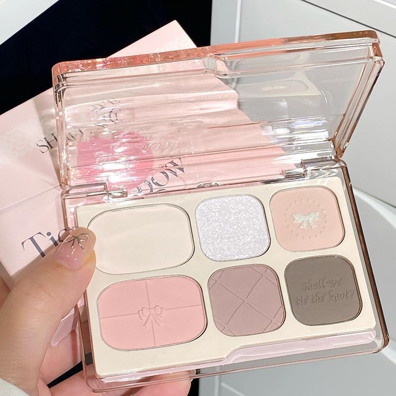 Bandeja de sombra de ojos de seis colores con lazo, rosa gris mate nacarado de baja saturación, rubor de alto brillo de color tierra, maquillaje falso