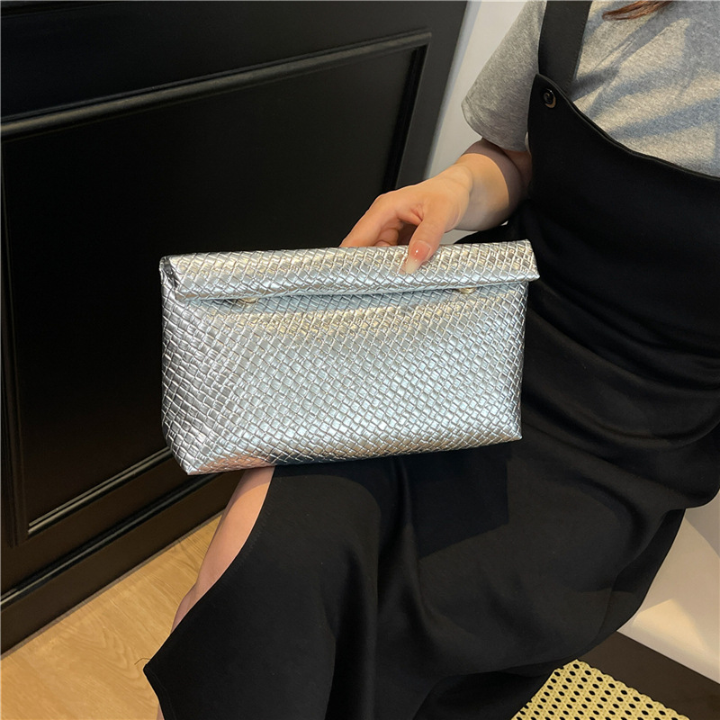 Bolsa de mano de gran capacidad popular de color sólido de alta calidad personalidad de mujer cena casual temperamento de estilo exterior