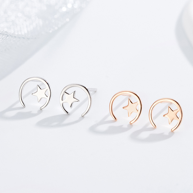 Minimalista estrella Luna Stud pendientes 925 Plata estrella Luna Stud pendientes mujeres simple nicho diseño temperamento oído joyería al por mayor