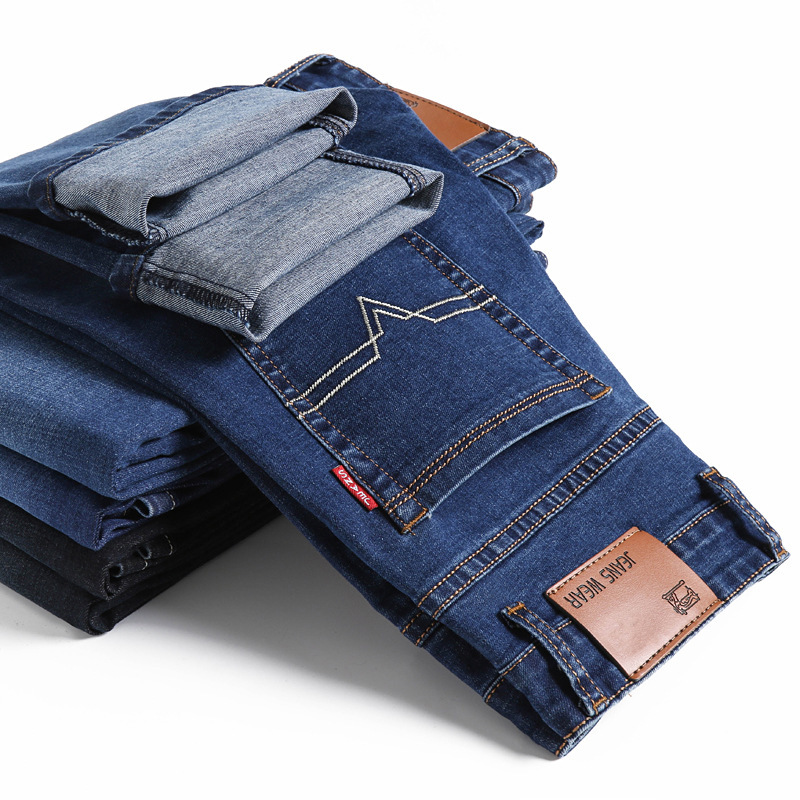 Ventas directas de fábrica de jeans para hombres Versión coreana de pantalones de mezclilla Xintang casuales elásticos de negocios para hombres de talla grande