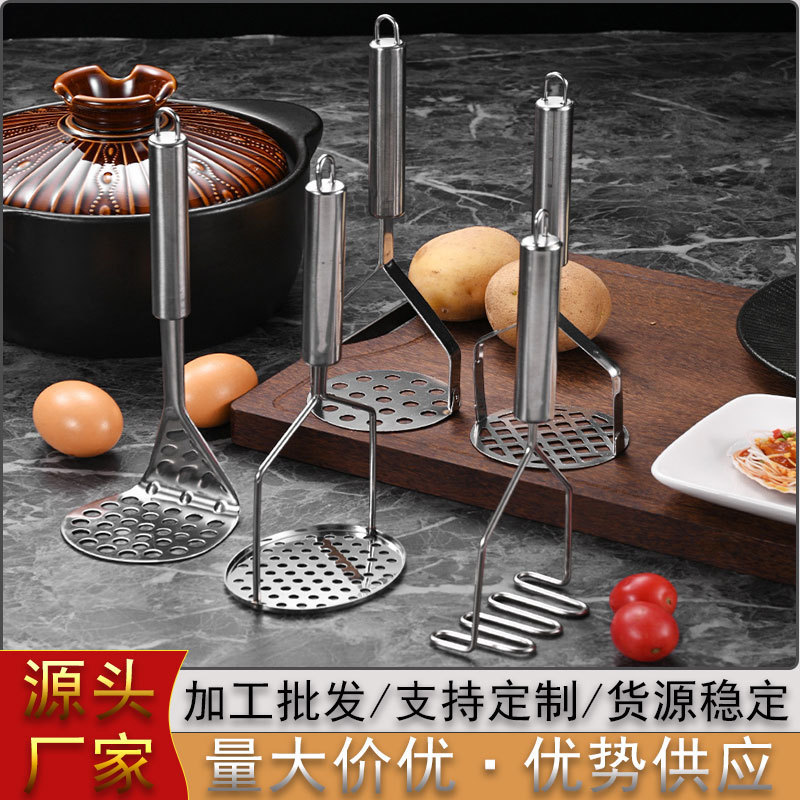 ステンレスのマッシュポテトのおろし器のおろし器のおろし器のおろし器のおろし器のニンニクのおろし器のおろし器のおろし器の台所の補助食の小道具|undefined