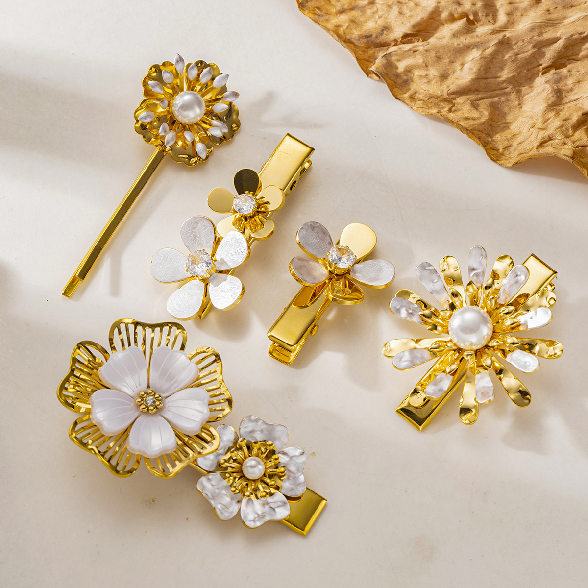 Tena Emisora de flores de acero inoxidable europea y americana Emisora de flores de nicho de todo fósforo Horquilla de acero de titanio dorado de 18k Explosiva transfronteriza