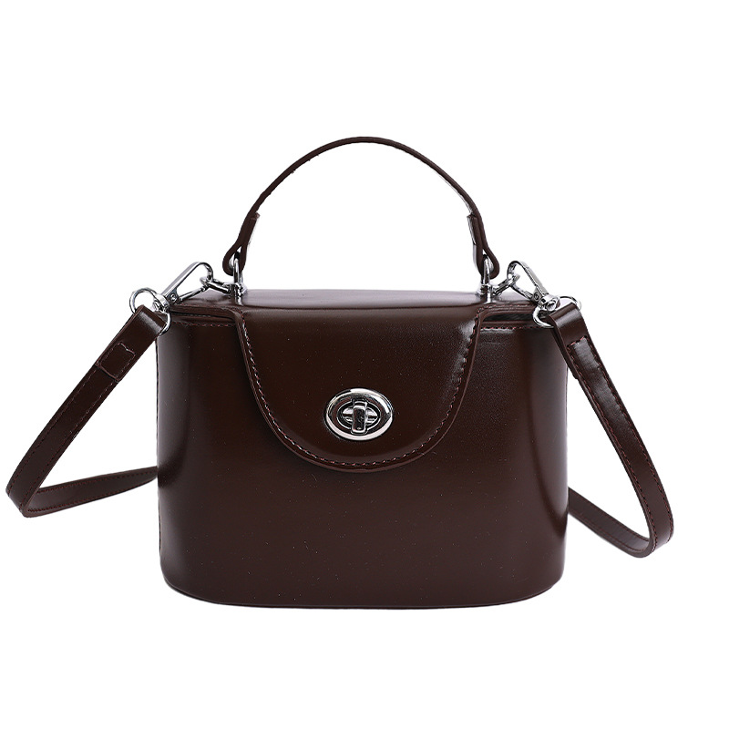 Nicho coreano caja de bloqueo de mano bolso pequeño para mujeres 2026 nueva moda exquisita versátil bolso de hombro