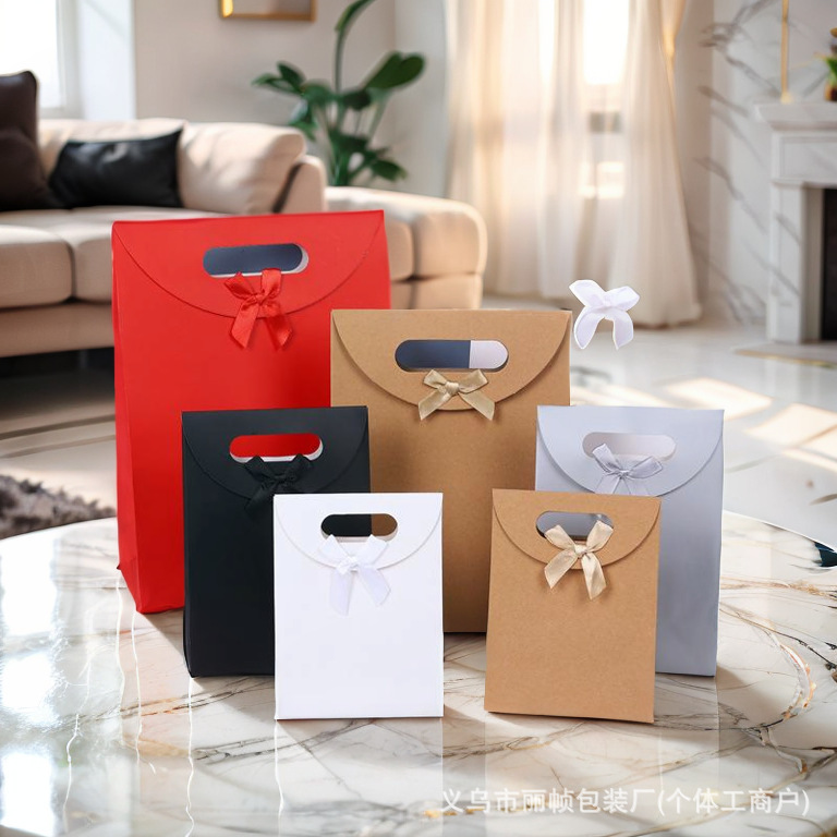 Cross-Border Ready-Made Flip-Top Bow Gift Bag, Four-Finger Buckle Handle Paper Bag, Velcro Seal Wholesale Handbag Cross-Border Ready-Made Flip-Top Bow Gift Bag, Four-Finger Buckle Handle Paper Bag, Velcro Seal Wholesale Handbag