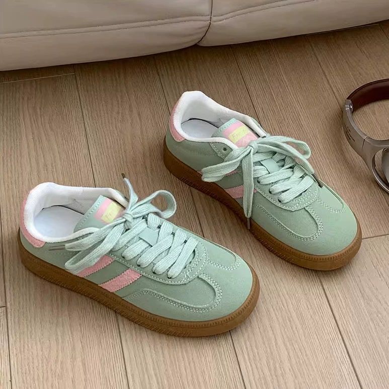 Retro zapatos de entrenamiento de la mujer 2025 primavera nuevos zapatos blancos de moda universal nicho zapatos deportivos casuales para estudiantes