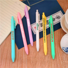 広告のペンの高い顔の価値のマカロンはペンの創意のかわいい学生の黒い水のペンのビジネスの事務の文房具を押してペンを書きます。