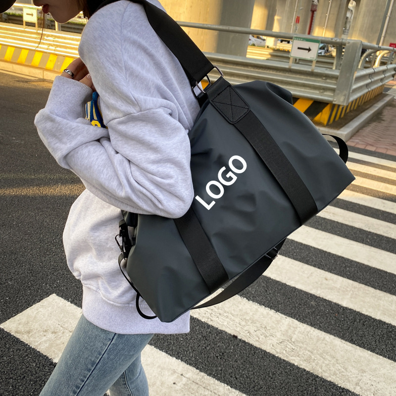 厂家批发户外外带短途出差旅行包迷彩尼龙运动包包大容量手提包