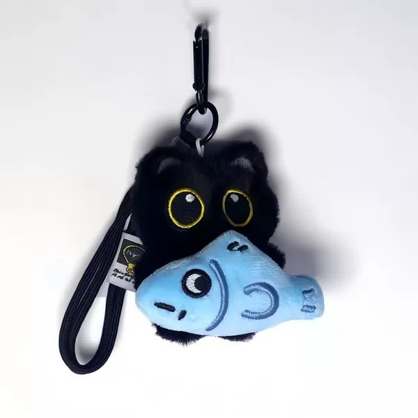 Holding blue fish, black cat + black rope