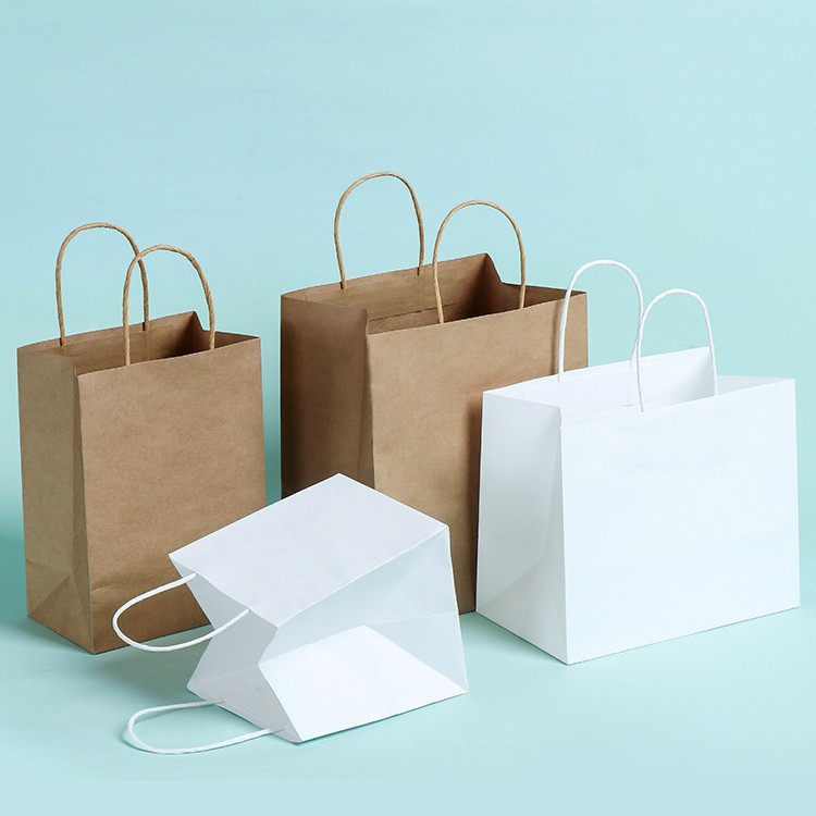 工厂宽底纸袋进口120克牛皮纸承重高档服装礼品包装纸袋paper bag