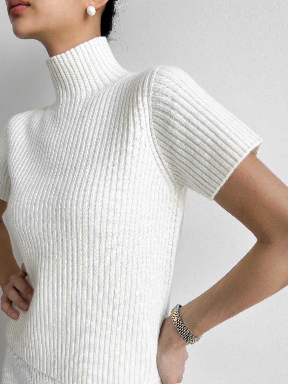 Abbigliamento donna chic primavera retrò temperamento collo alto versatile maglione a maniche corte + gonna con spacco sui fianchi tailleur gonna_voghion.com