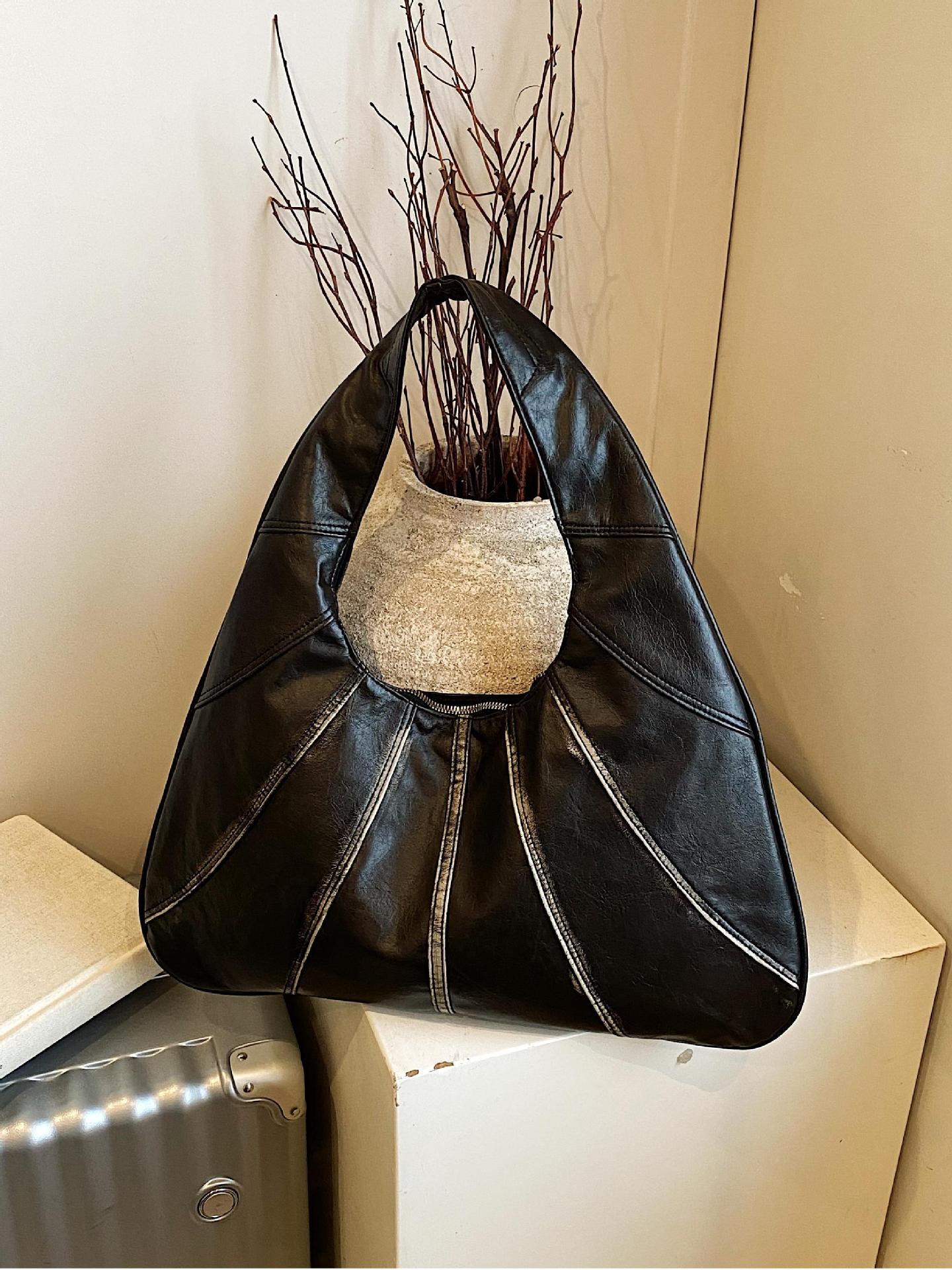 Bolsos retro para axilas para mujer 2025 nuevo bolso de hombro de nicho casual de todo fósforo bolso de viaje portátil de alta gama de moda