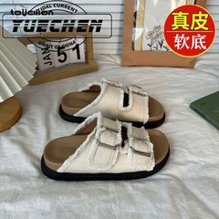 女性の夏のアウターウェア用のニッチなレトロなタッセルスリッパ、ファッショナブルなベルトバックル、女性用のカジュアルな厚底ビーチサンダル