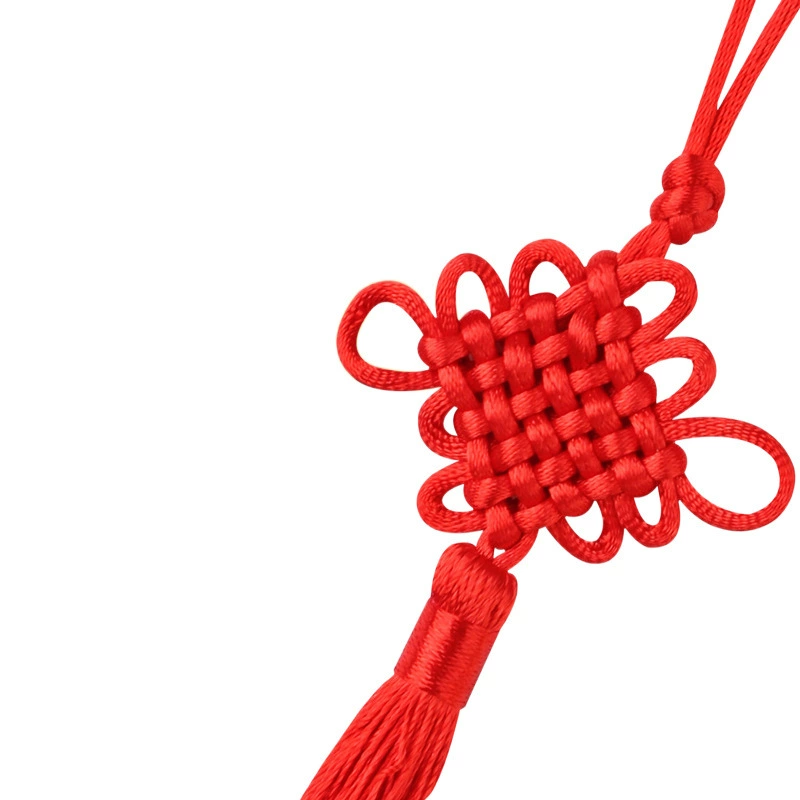Small red pendant with tassels, strap, protective amulet